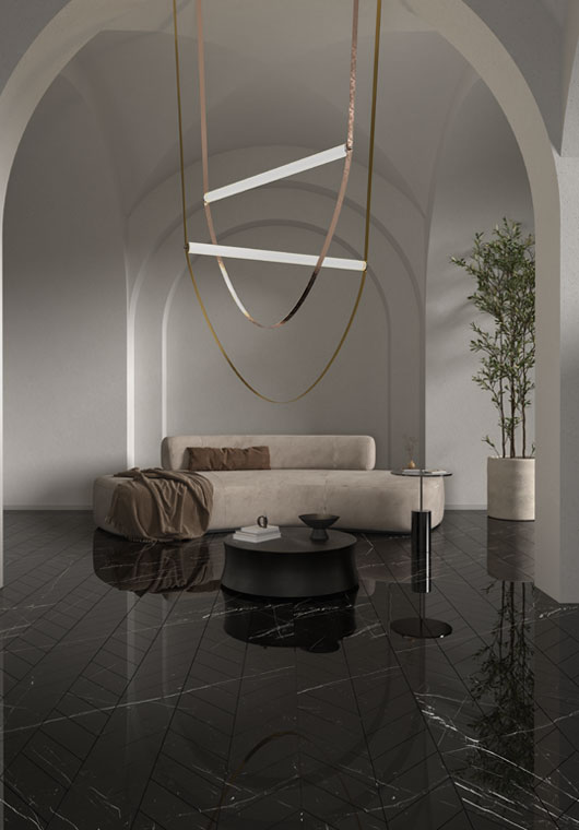 A luxurious living room with black ceramic floors and a grand chandelier illuminating the space.